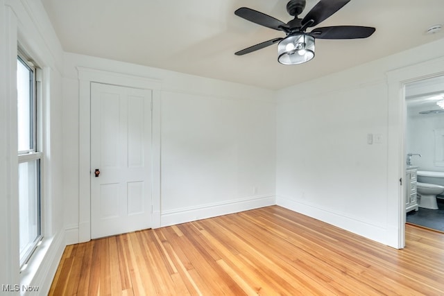 235 Elm St, Oberlin, OH 44074 - unfurnished room with light wood-type flooring and a ceiling fan
