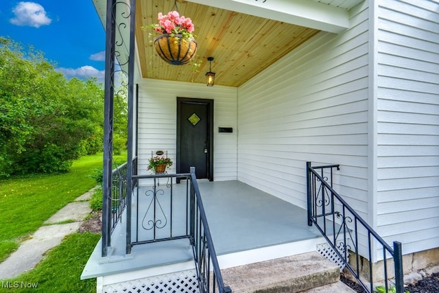 235 Elm St, Oberlin, OH 44074 - entrance to property with covered porch and a lawn