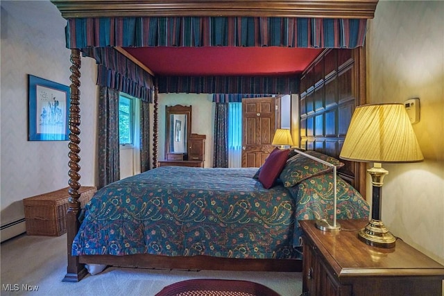 875 N Medina Line Rd, Akron, OH 44333 - carpeted bedroom featuring wallpapered walls and a baseboard heating unit