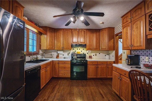 875 N Medina Line Rd, Akron, OH 44333 - kitchen with black appliances, a sink, extractor fan, light countertops, and brown cabinets