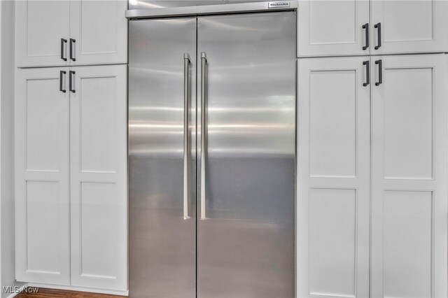 2344 Country Brook Dr, Hinckley, OH 44233 - kitchen featuring built in fridge and white cabinets
