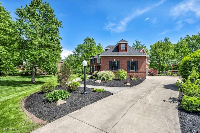 2344 Country Brook Dr, Hinckley, OH 44233 - view of front of home featuring brick siding, a front lawn, and driveway