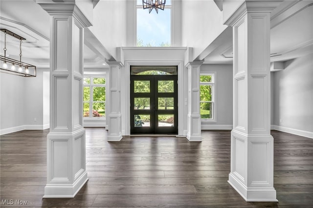 2344 Country Brook Dr, Hinckley, OH 44233 - foyer entrance with ornate columns, baseboards, and a towering ceiling
