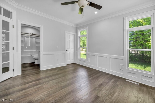 2344 Country Brook Dr, Hinckley, OH 44233 - unfurnished bedroom with a decorative wall, dark wood-type flooring, ornamental molding, wainscoting, and ceiling fan