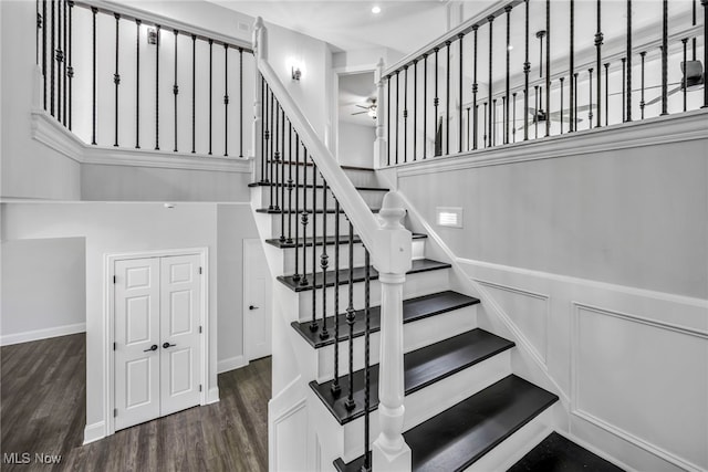 2344 Country Brook Dr, Hinckley, OH 44233 - staircase featuring ceiling fan, wood finished floors, and baseboards