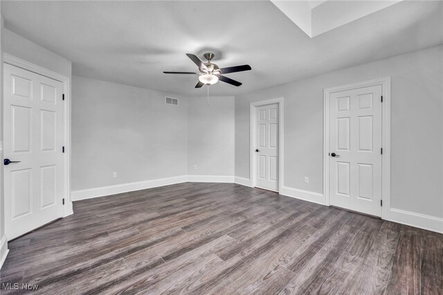 2344 Country Brook Dr, Hinckley, OH 44233 - unfurnished bedroom featuring dark wood-style floors, baseboards, and ceiling fan