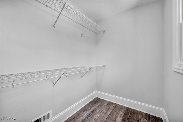 2344 Country Brook Dr, Hinckley, OH 44233 - walk in closet with dark wood-style floors