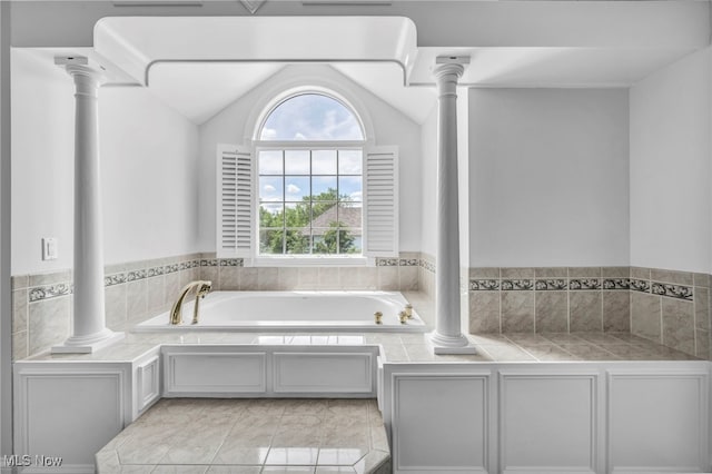 2344 Country Brook Dr, Hinckley, OH 44233 - bathroom with decorative columns, a garden tub, and vaulted ceiling