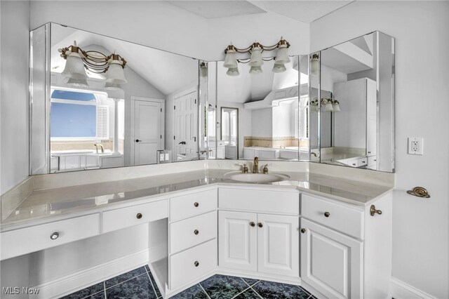 2344 Country Brook Dr, Hinckley, OH 44233 - bathroom with lofted ceiling, vanity, and tile patterned floors