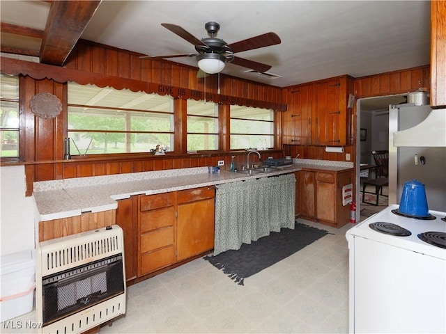 12209 Tinkers Creek Rd, Valley View, OH 44125 - kitchen with heating unit, electric range, ceiling fan, light countertops, and light floors