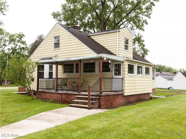 12209 Tinkers Creek Rd, Valley View, OH 44125 - bungalow-style home with a front lawn and a shingled roof
