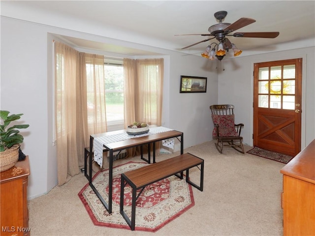 12209 Tinkers Creek Rd, Valley View, OH 44125 - dining room with light colored carpet and a ceiling fan