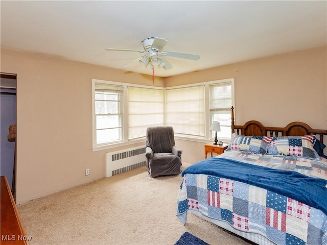 12209 Tinkers Creek Rd, Valley View, OH 44125 - carpeted bedroom featuring radiator heating unit and a ceiling fan