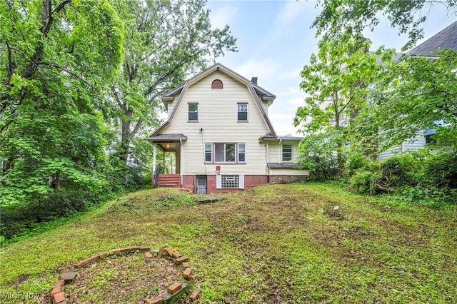 10234 Park Heights Rd, Cleveland, OH 44104 - back of house featuring a gambrel roof