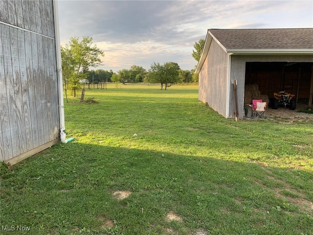 10677 Moss Rd, Lodi, OH 44254 - view of green lawn featuring an outbuilding