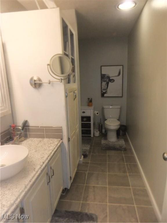 10677 Moss Rd, Lodi, OH 44254 - bathroom featuring tile patterned flooring, vanity, and toilet