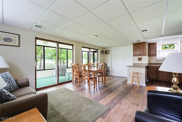 32094 Woodale Dr, Hanoverton, OH 44423 - dining area with a drop ceiling and wood finished floors
