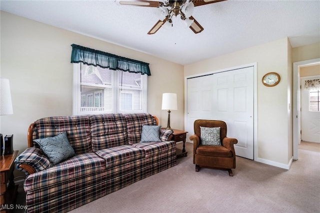 32094 Woodale Dr, Hanoverton, OH 44423 - living room with carpet floors, a ceiling fan, and baseboards