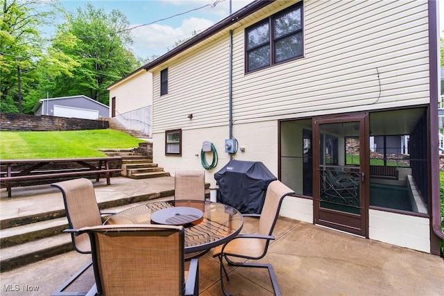 32094 Woodale Dr, Hanoverton, OH 44423 - view of patio / terrace with a grill, stairway, and outdoor dining area