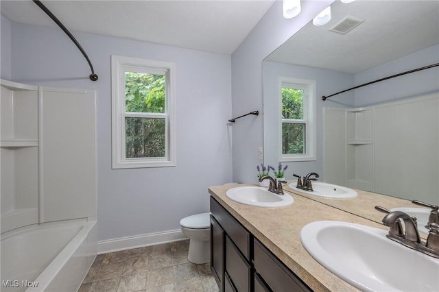 443 S Hametown Rd, Copley, OH 44321 - full bath featuring healthy amount of natural light, baseboards, tub / shower combination, and double vanity