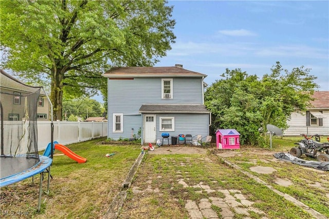 2011 Clark Ave, Wellsville, OH 43968 - back of property featuring a trampoline