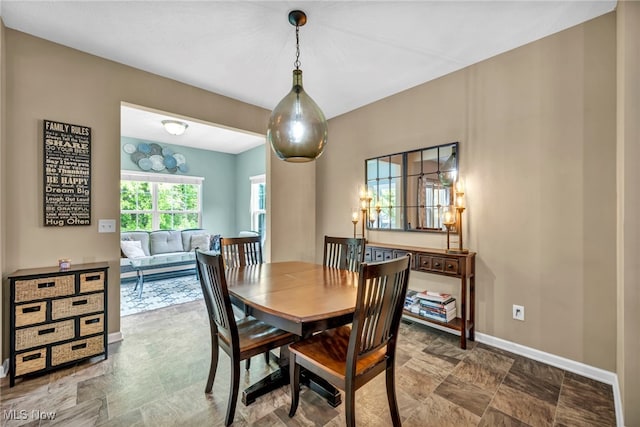 713 Westpointe Dr, Amherst, OH 44001 - dining area featuring baseboards