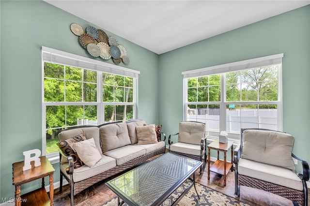 713 Westpointe Dr, Amherst, OH 44001 - living room featuring healthy amount of natural light and wood finished floors