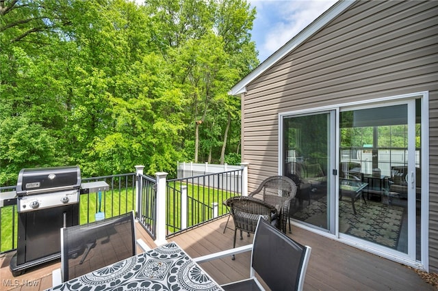 713 Westpointe Dr, Amherst, OH 44001 - wooden deck featuring a lawn and a grill