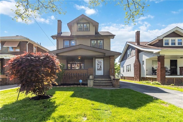 3566 Ludgate Rd, Shaker Heights, OH 44120 - traditional style home with a porch and a front yard