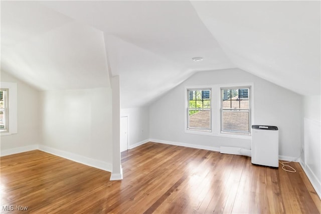 3566 Ludgate Rd, Shaker Heights, OH 44120 - additional living space featuring wood-type flooring, vaulted ceiling, and baseboards