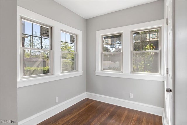 3566 Ludgate Rd, Shaker Heights, OH 44120 - empty room featuring baseboards and dark wood-style floors