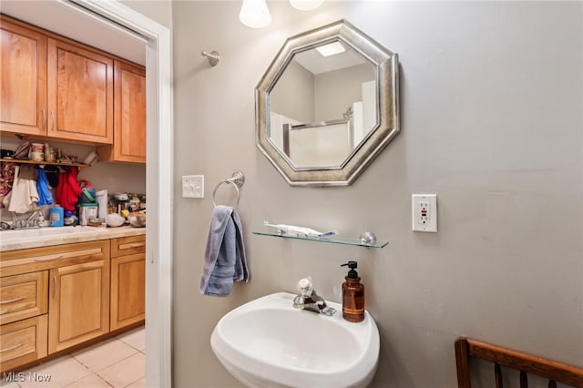 153 N Doan Ave, Painesville, OH 44077 - bathroom with a sink and tile patterned floors