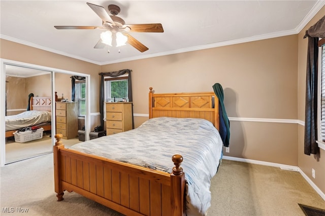 153 N Doan Ave, Painesville, OH 44077 - bedroom with carpet floors, a ceiling fan, baseboards, and ornamental molding