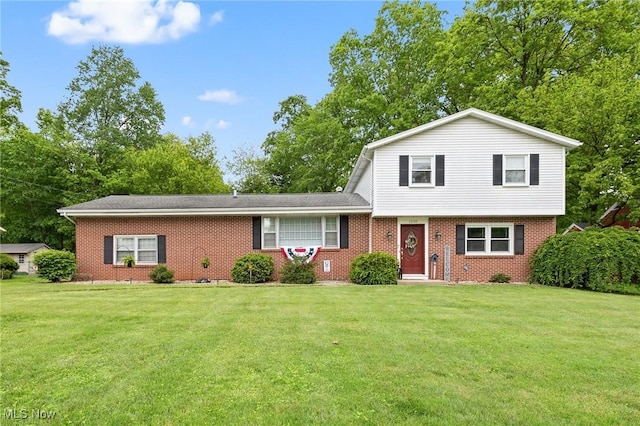 1228 Edgehill Ave, Ashland, OH 44805 - view of front of house with brick siding and a front lawn