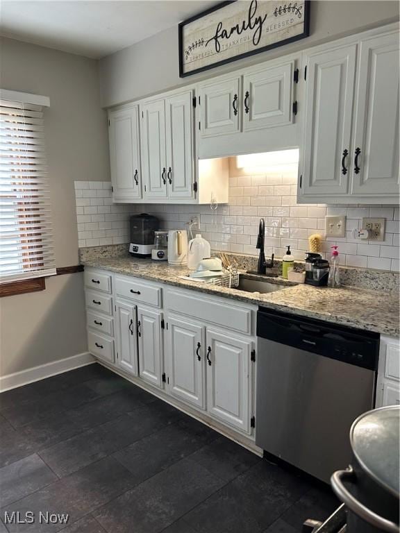 16112 Raymond St, Maple Heights, OH 44137 - kitchen with dishwasher, white cabinets, tasteful backsplash, and a sink