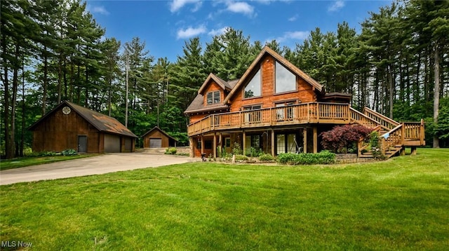 5360 Lance Rd, Medina, OH 44256 - back of house with a wooden deck, a lawn, an outbuilding, a detached garage, and stairway
