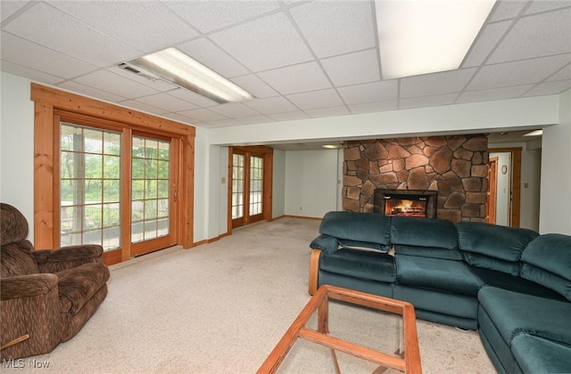 5360 Lance Rd, Medina, OH 44256 - carpeted living area featuring a fireplace, baseboards, and a paneled ceiling