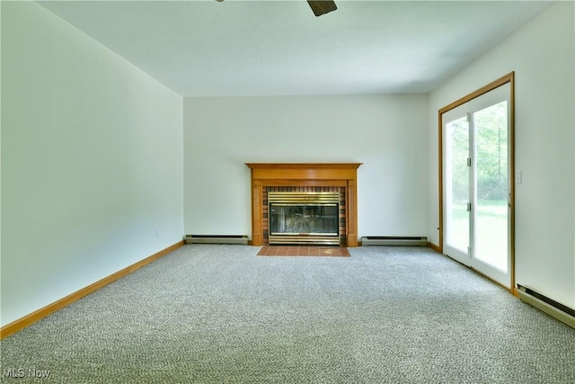 5990 Stewart Sharon Rd, Hubbard, OH 44425 - unfurnished living room featuring a baseboard heating unit, plenty of natural light, carpet floors, and a baseboard radiator
