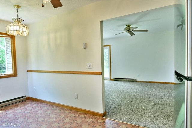 5990 Stewart Sharon Rd, Hubbard, OH 44425 - unfurnished room with a ceiling fan, a baseboard radiator, and baseboards
