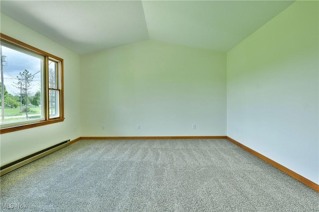 5990 Stewart Sharon Rd, Hubbard, OH 44425 - empty room featuring a baseboard heating unit, carpet, vaulted ceiling, and baseboards