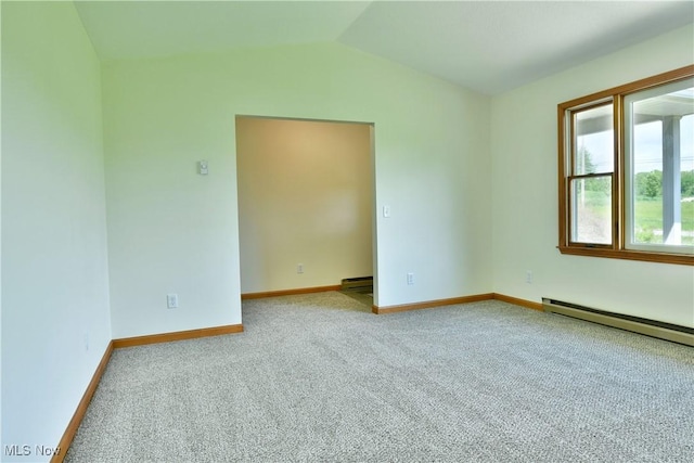 5990 Stewart Sharon Rd, Hubbard, OH 44425 - spare room with a baseboard heating unit, carpet, vaulted ceiling, baseboards, and baseboard heating