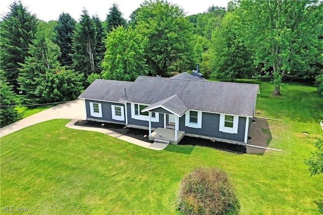 5990 Stewart Sharon Rd, Hubbard, OH 44425 - view of front of home with a front yard and a shingled roof
