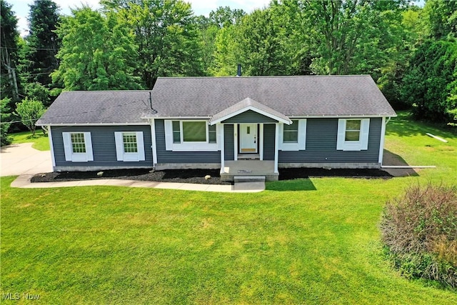 5990 Stewart Sharon Rd, Hubbard, OH 44425 - view of front of house featuring a front lawn and roof with shingles