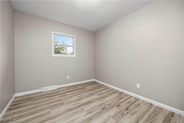 6265 Jaycox Rd, North Ridgeville, OH 44039 - unfurnished room featuring baseboards and wood finished floors