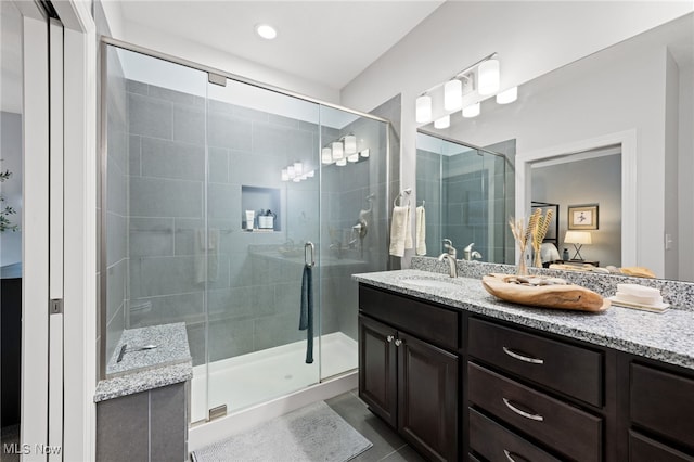 1343 W Clifton Blvd, Lakewood, OH 44107 - bathroom with vanity, a shower stall, and tile patterned flooring