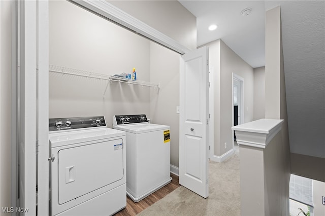 1343 W Clifton Blvd, Lakewood, OH 44107 - washroom with washer and dryer, light wood-type flooring, baseboards, and recessed lighting