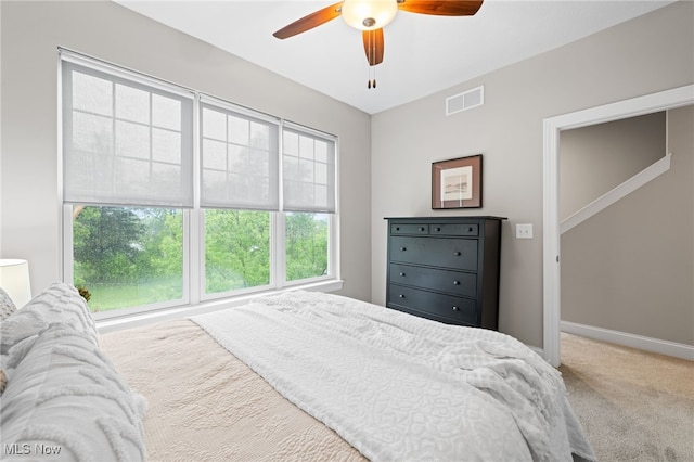 1343 W Clifton Blvd, Lakewood, OH 44107 - bedroom with carpet floors, baseboards, and a ceiling fan