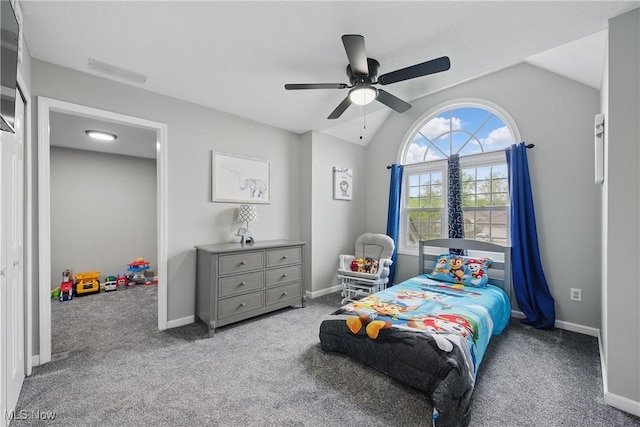 301 Tower Ln, Amherst, OH 44001 - carpeted bedroom with lofted ceiling, baseboards, and ceiling fan