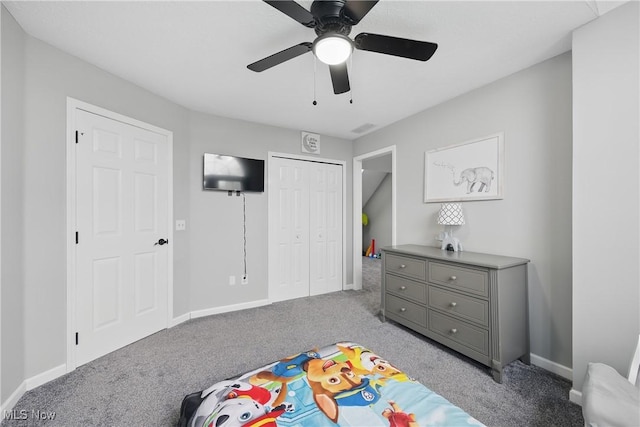 301 Tower Ln, Amherst, OH 44001 - bedroom featuring carpet flooring, a closet, baseboards, and ceiling fan