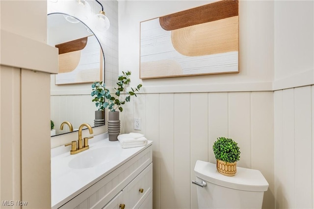 2546 Atlantic, Warren, OH 44483 - half bath with vanity, toilet, and a decorative wall